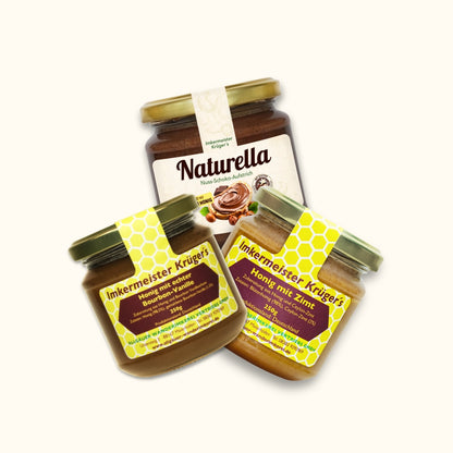 Kleine Helden Genuss-Trio mit Honig mit echter Bourbon-Vanille 250g, Honig mit Zimt 250g und Naturella 200g in einem Set zum reduzierten Preis von 20€ statt 24€, nur für kurze Zeit zum Weltkindertag von der Allgäuer Wanderimkerei